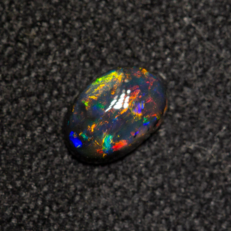 0.18 ct black opal 4.9x3.3x1.7mm - Image 2