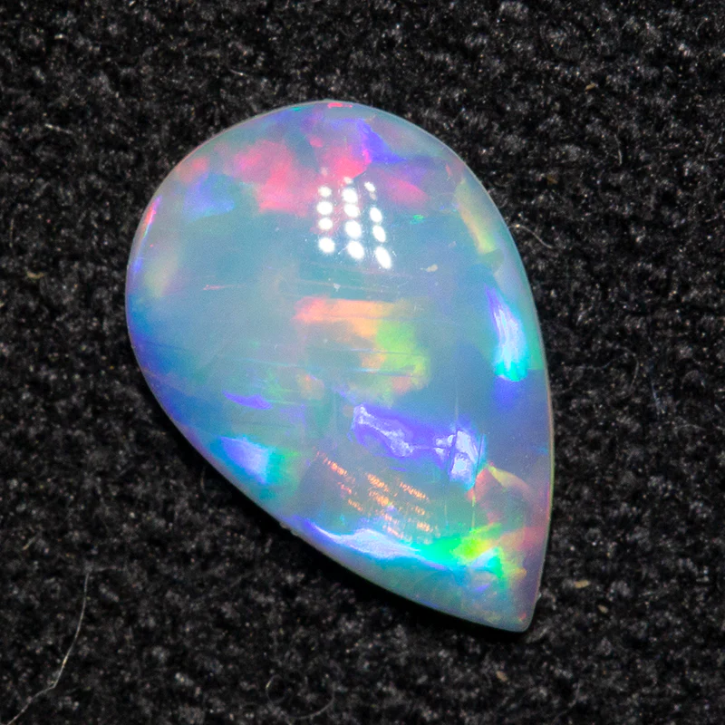 0.29 ct white opal 7.1x4.7x1.6mm - Image 2