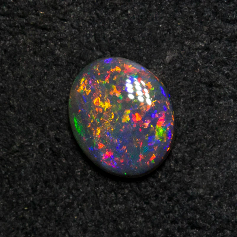 0.31 ct black opal 5.7x4.8x1.8mm - Image 3