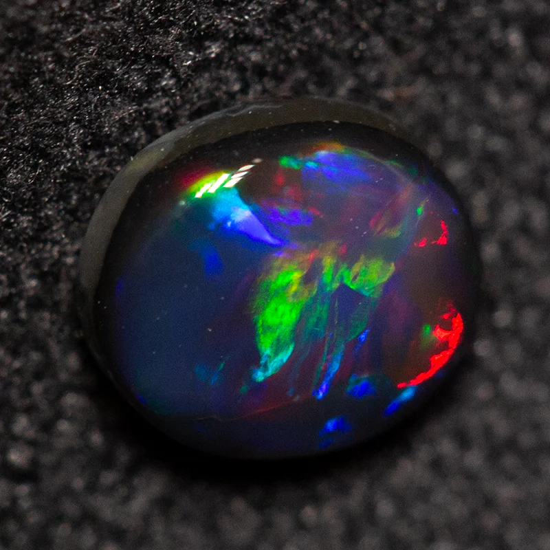 0.38 ct black opal 5.3x4.7x2.2mm - Image 2