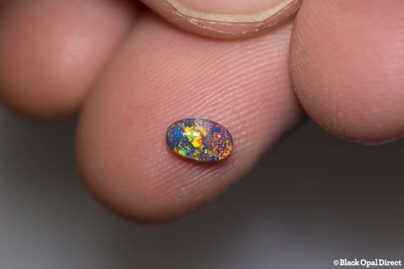0.38 ct black opal 6x4.8x2mm - Image 2