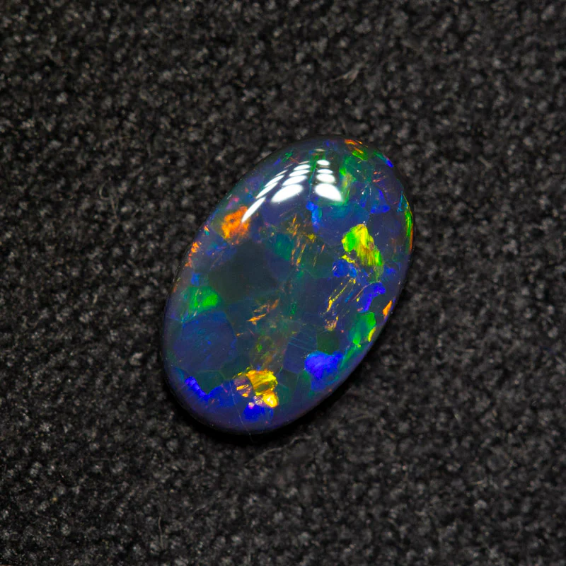 0.38 ct black opal 7x4.5x1.7mm - Image 2