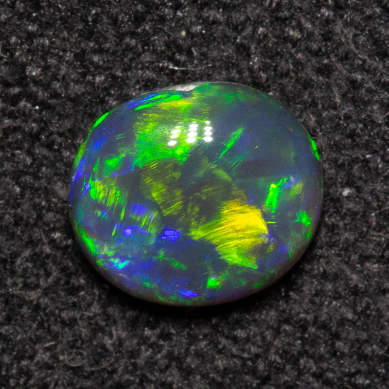 0.39 ct black opal 5.4x4.7x2.3mm - Image 2