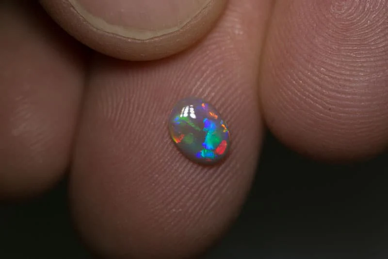 0.39 ct dark opal 7x5x1.5mm - Image 2