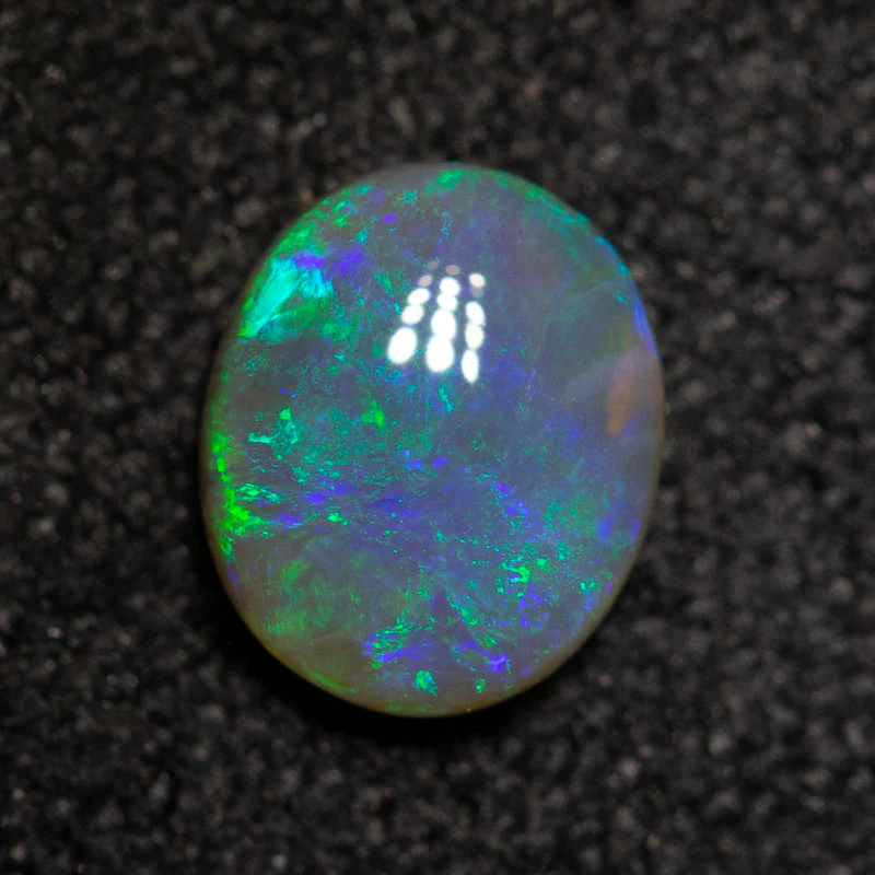 0.40 ct dark crystal opal 5.6x4.7x2.3mm - Image 2