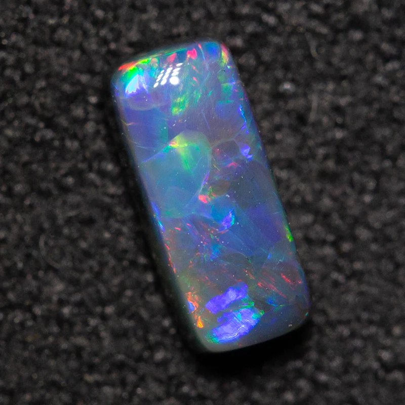 0.41 ct black opal 6.6x2.9x2.4mm - Image 4