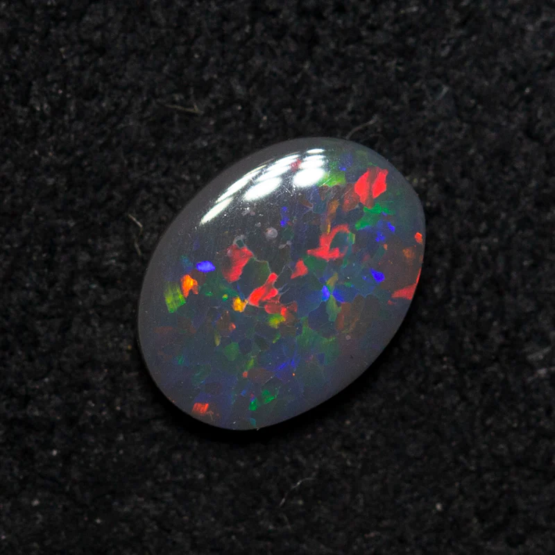 0.41 ct black opal 6.6x5x1.8mm - Image 2