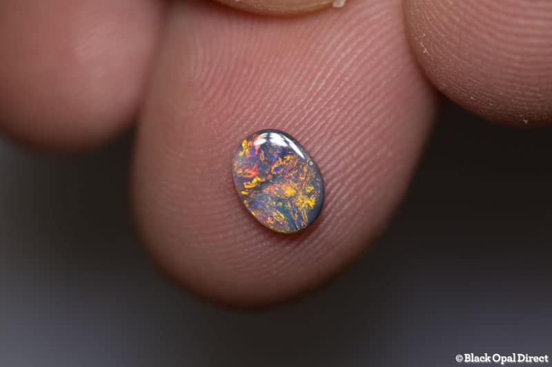 0.41 ct dark opal 7x5x1.5mm - Image 2