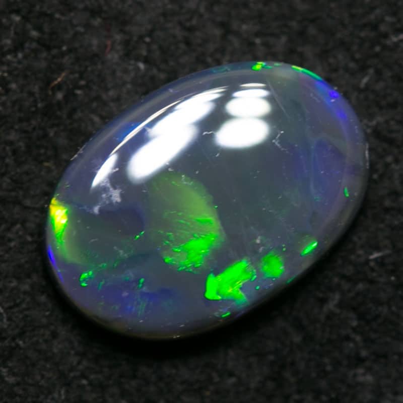 0.42 ct black opal 7x4.5x2mm - Image 2