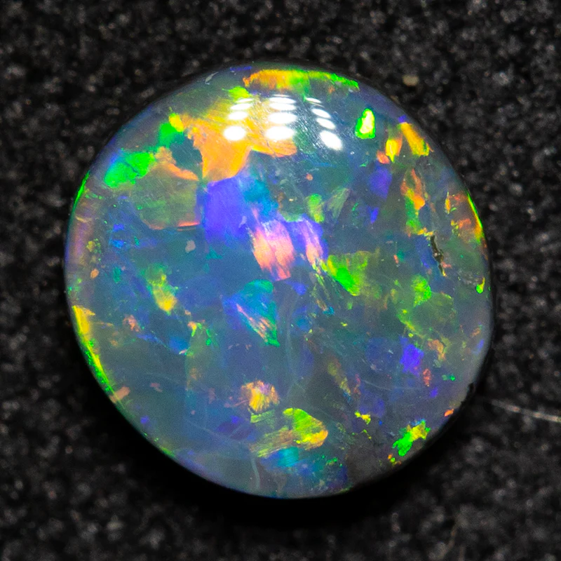 0.44 ct black opal 5.6x5.3x2.2mm - Image 2
