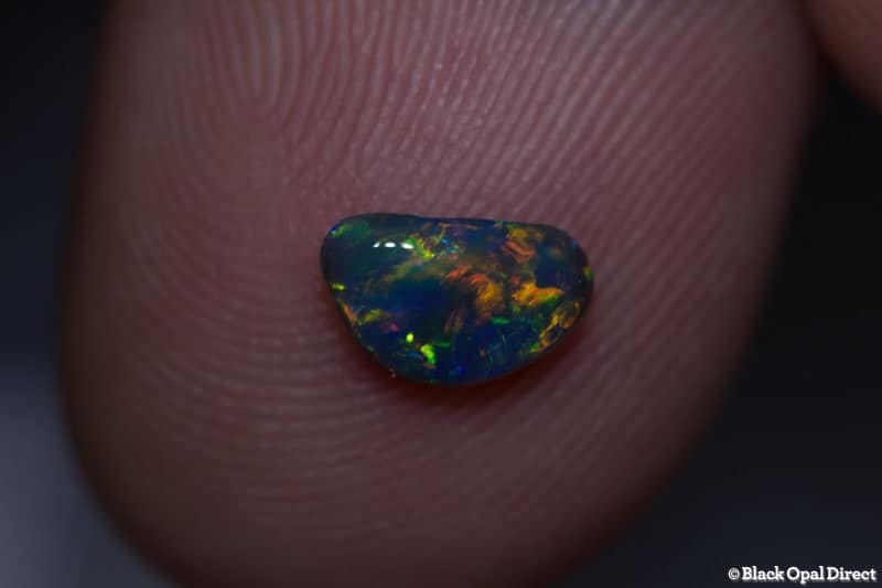 0.45 ct black opal gem 7x5x2mm - Image 2