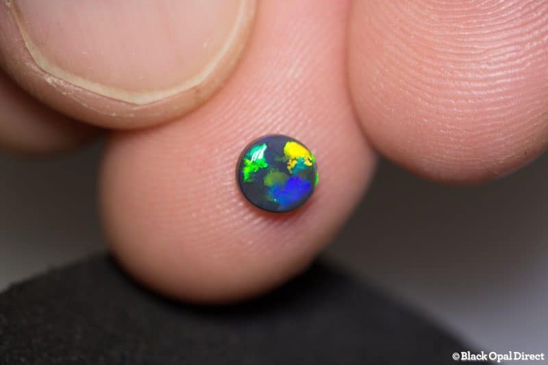0.48 ct black opal 5mm round x 2mm - Image 2