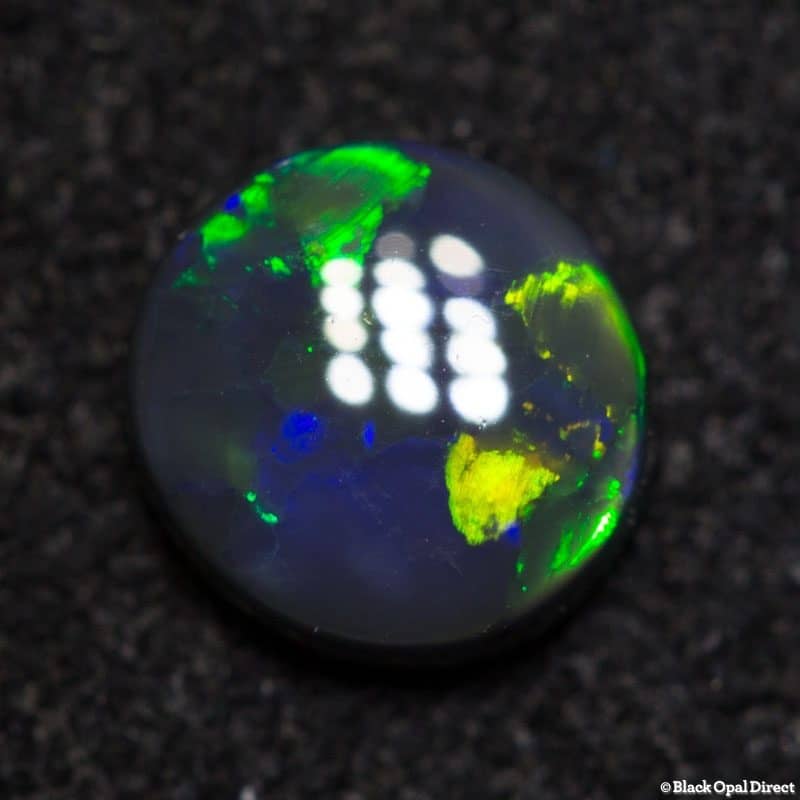 0.48 ct black opal 5mm round x 2mm - Image 4
