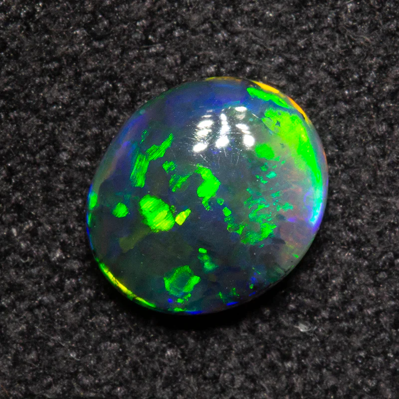 0.48 ct double-sided black opal 5.9x5.1x2.3mm - Image 2