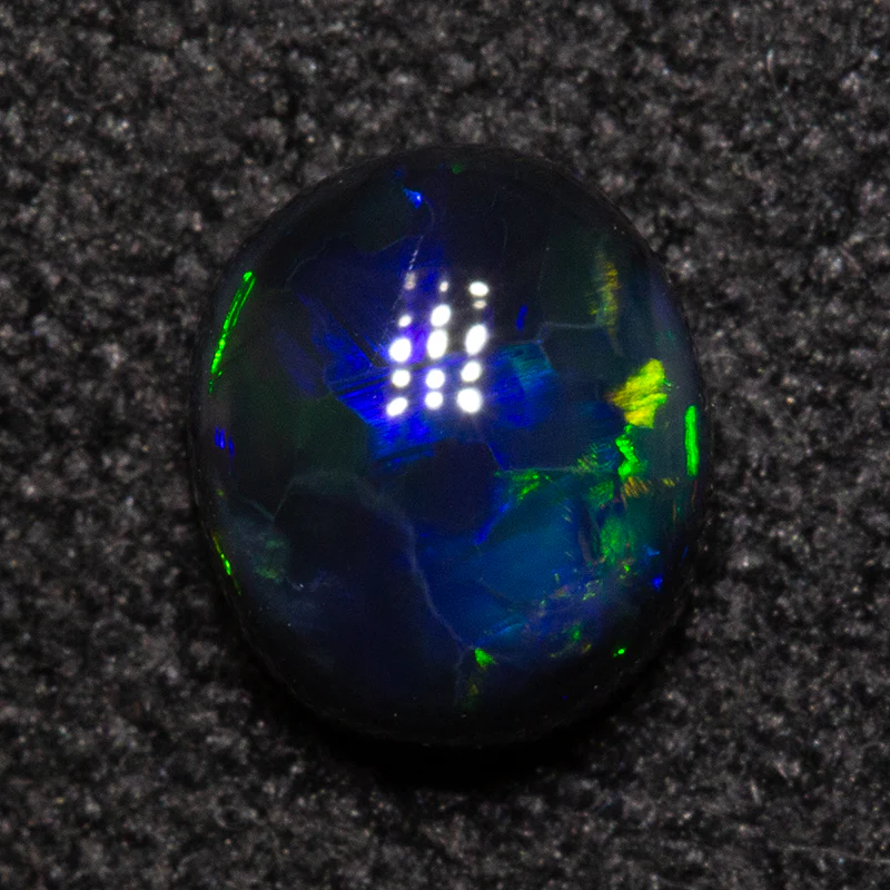 0.49 ct black opal 4.7x5.4x2.6mm - Image 2