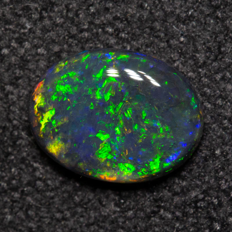 0.49 ct black opal 6.7x5.1x2mm - Image 2