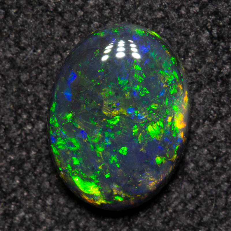0.49 ct black opal 6.7x5.1x2mm - Image 3