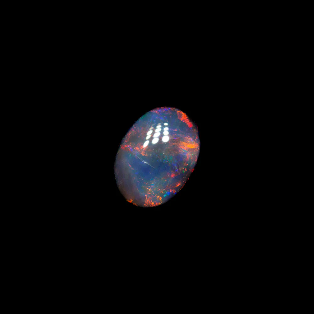 0.49 ct double-sided  black opal 5.7x4.3x2.8mm - Image 2