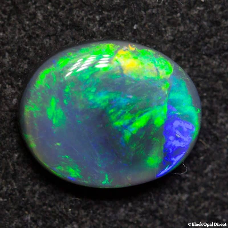 0.50 ct dark opal 7x5.5x2mm - Image 3