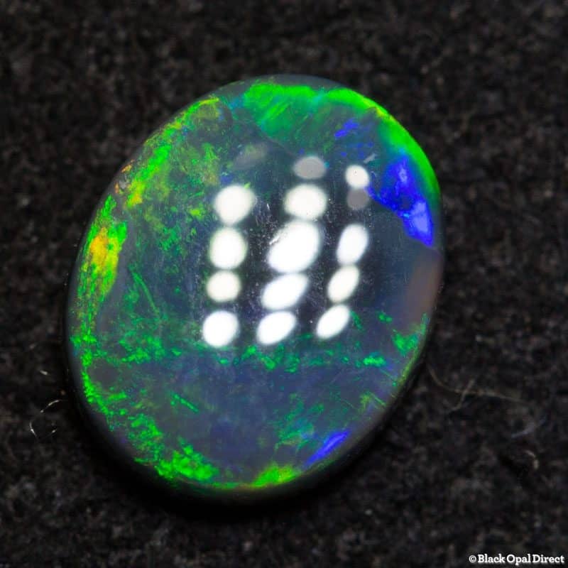 0.50 ct dark opal 7x5.5x2mm - Image 4