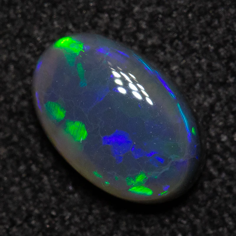 0.51 ct black opal 6.6x4.3x2.5mm - Image 2
