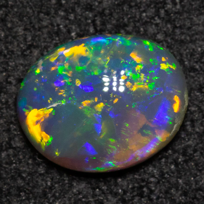 0.51 ct black opal 6.6x5.3x2.5mm - Image 2