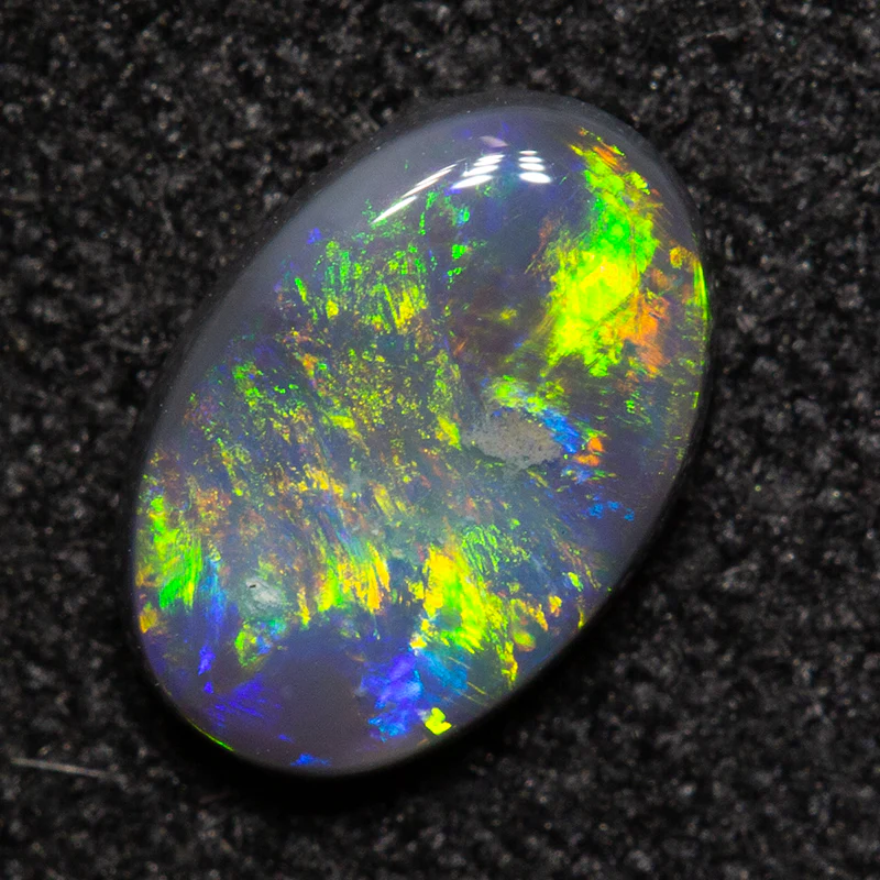 0.51 ct black opal 7.1x4.8x2mm - Image 2