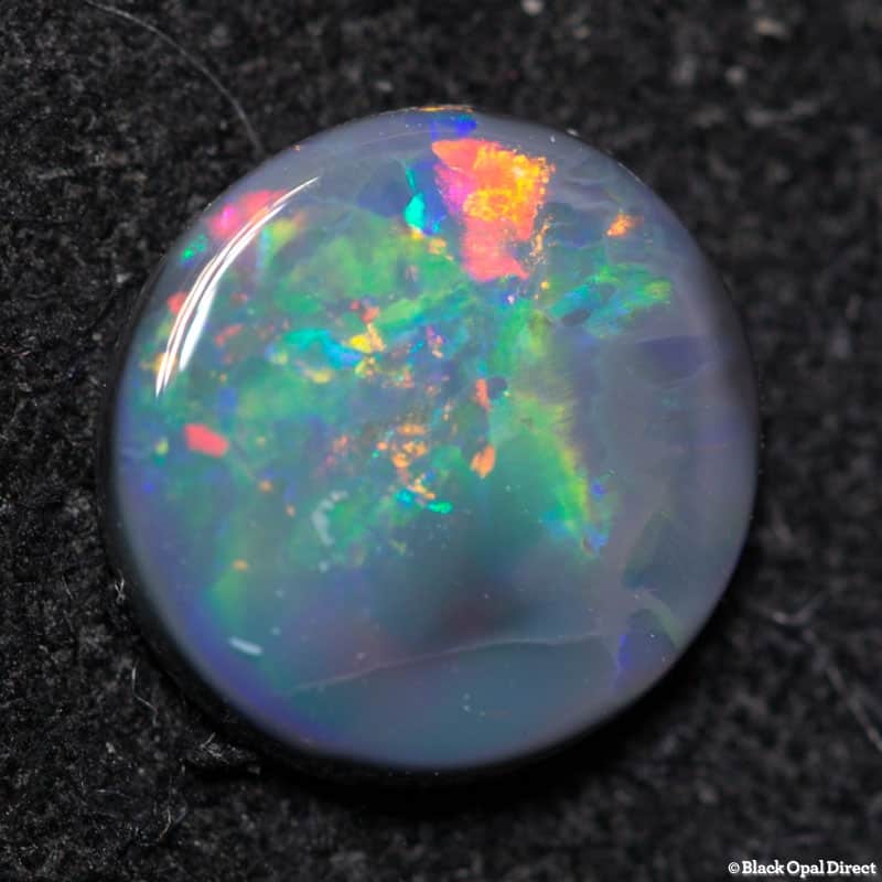 0.52 ct black opal 6mm round x 1.5mm - Image 2
