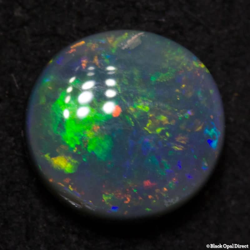 0.52 ct black opal 6mm round x2mm - Image 3