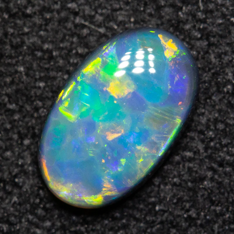 0.52 ct black opal 7x4.5x2.3mm - Image 2