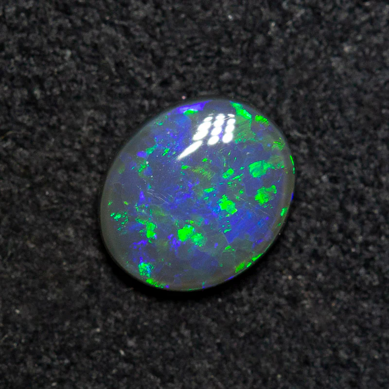 0.53 ct black opal 6.4x5.5x2.4mm - Image 2