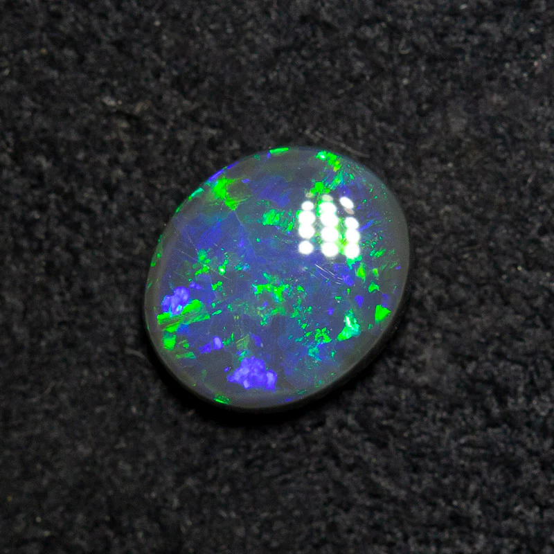 0.53 ct black opal 6.4x5.5x2.4mm - Image 3