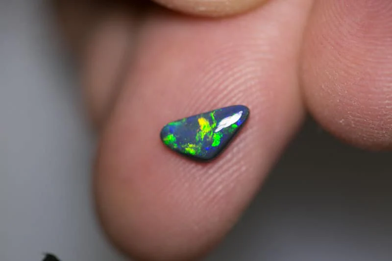 0.54 ct baroque black opal 8.5x4.5x2mm - Image 3