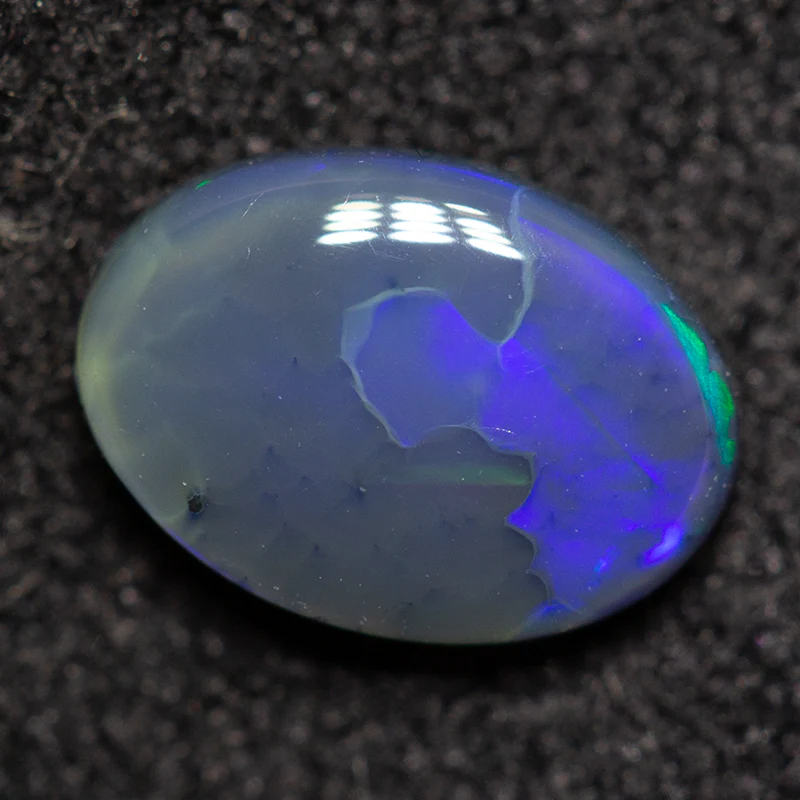 0.54 ct black opal 6.9x5x2.2mm - Image 3