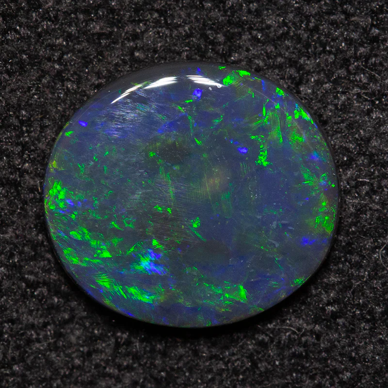 0.54 ct black opal 7.5x6.8x1.4mm - Image 2