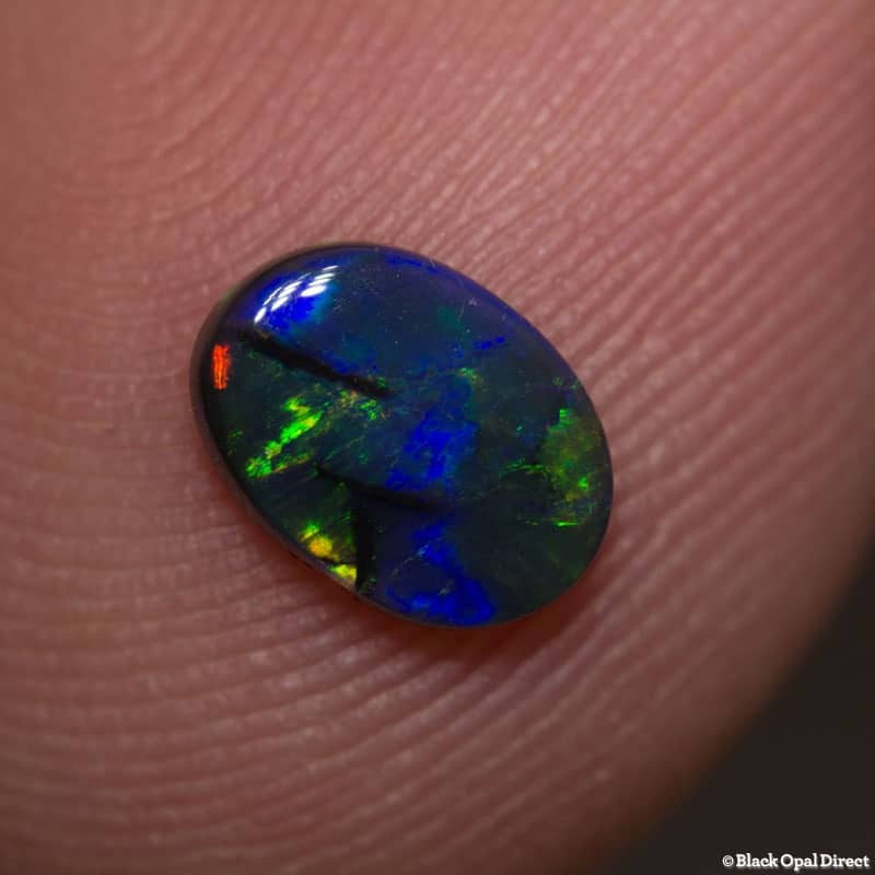 0.54 ct black opal 7x5x1.5mm - Image 2