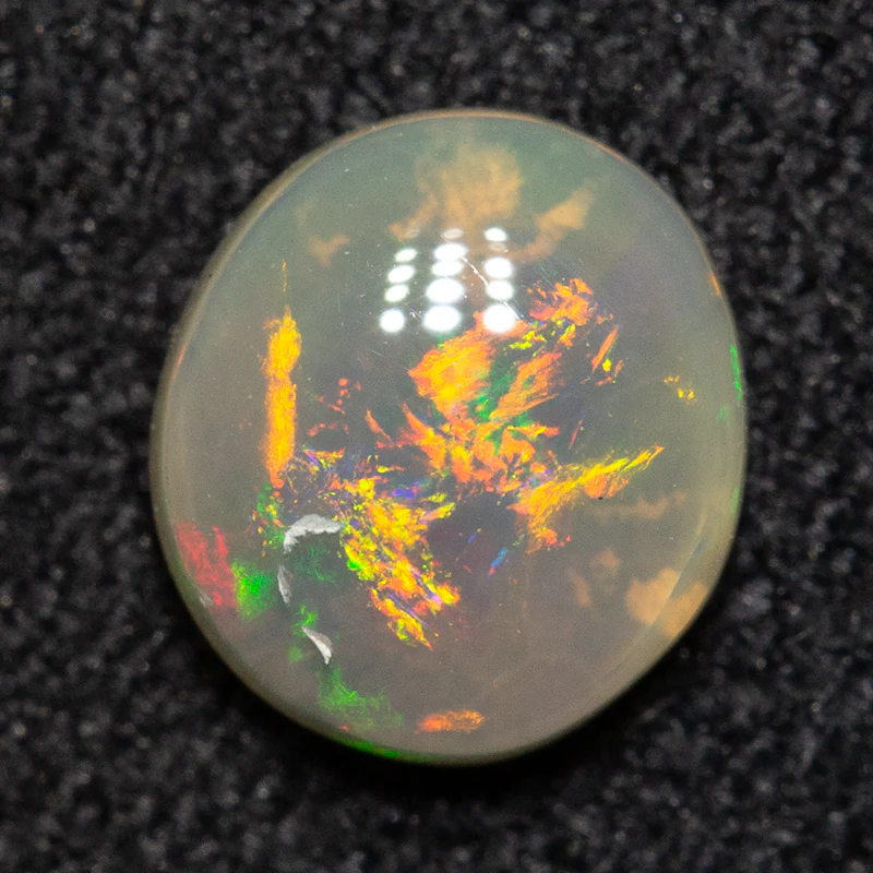 0.54 ct white opal 6.1x5.5x2.4mm - Image 2