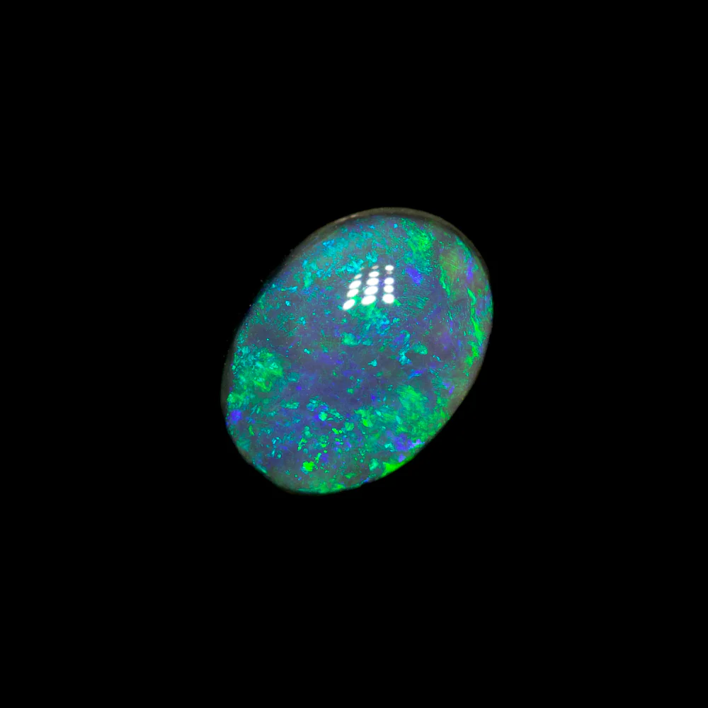 0.55 ct black opal 6.4x4.8x2.7mm - Image 2