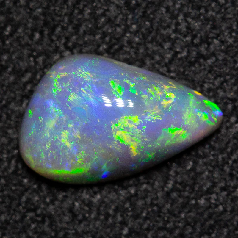 0.55 ct black opal 7.7x4.9x2.8mm - Image 2