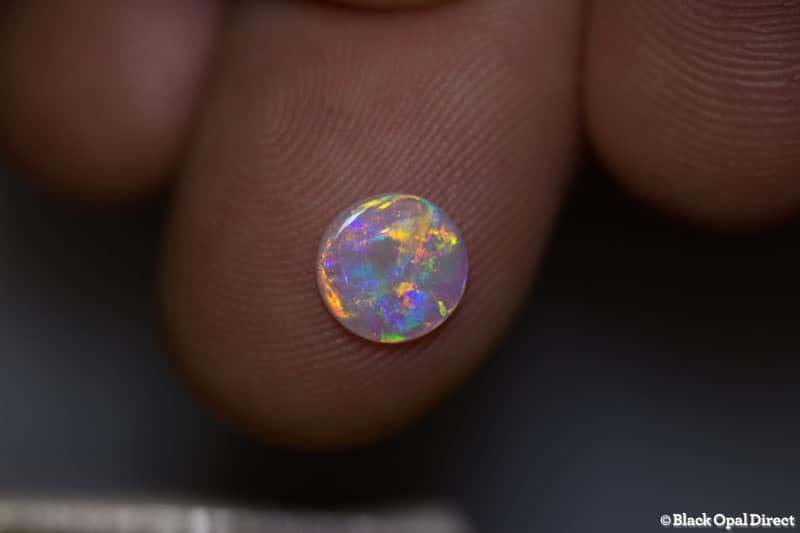 0.55 ct crystal opal 7mm round x 1mm thick - Image 2