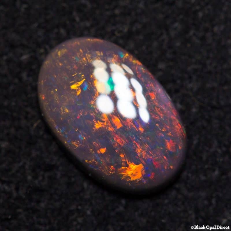 0.55 ct dark opal 8x6x1.5mm - Image 2