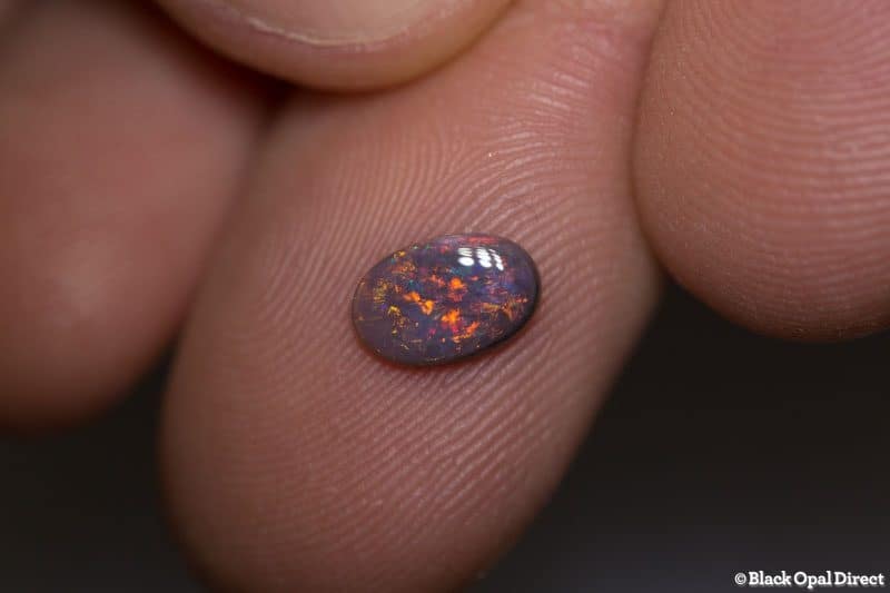 0.55 ct dark opal 8x6x1.5mm - Image 3