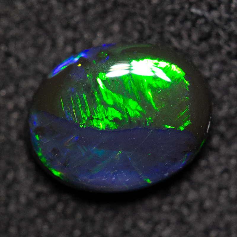0.55 ct double-sided black opal 6.6x5.2x2.3mm - Image 4