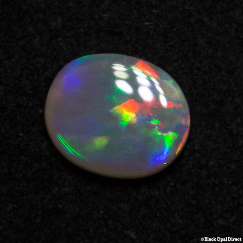 0.55 ct semi black opal 6.8x5.5x2mm - Image 3