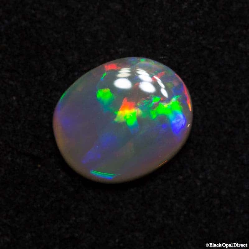 0.55 ct semi black opal 6.8x5.5x2mm - Image 4