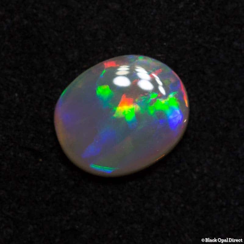 0.55 ct semi black opal 6.8x5.5x2mm - Image 5