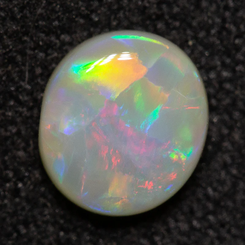 0.55 ct white opal 6.1x5.4x2.2mm - Image 2