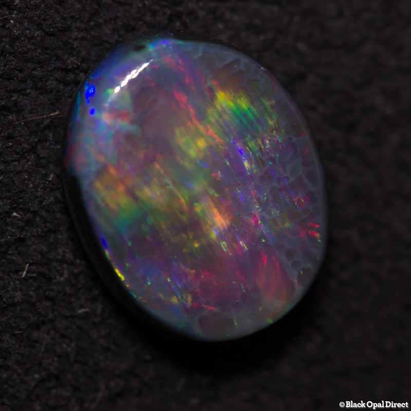 0.56 ct black opal 6.5x5x2mm - Image 2