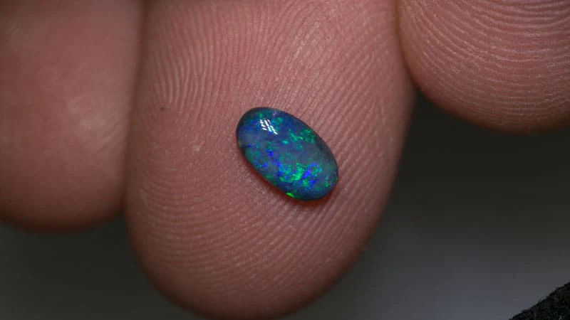 0.56 ct black opal 7.5x4x2mm - Image 2