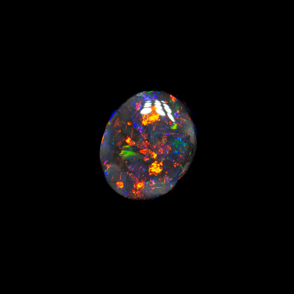 0.56 ct double-sided black opal 6.4x5.2x2.3mm - Image 3